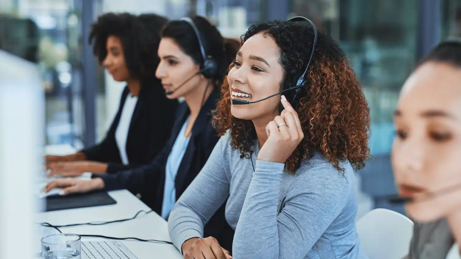 PayCentral_Press_Release_Banner_June-1 (1) Customer service team wearing headsets assisting PayCentral clients